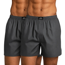Load image into Gallery viewer, Two pairs of grey boxer briefs with brand labels on a grey background