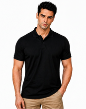 Load image into Gallery viewer, Man wearing a black polo shirt on a white background with 'Limited Edition' text.